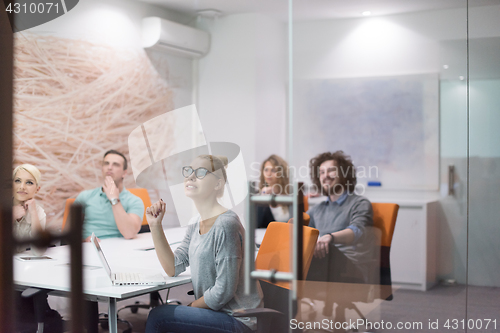 Image of Startup Business Team At A Meeting at modern night office buildi