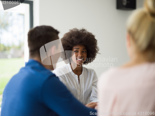 Image of Multiethnic startup Business Team At A Meeting at modern office 