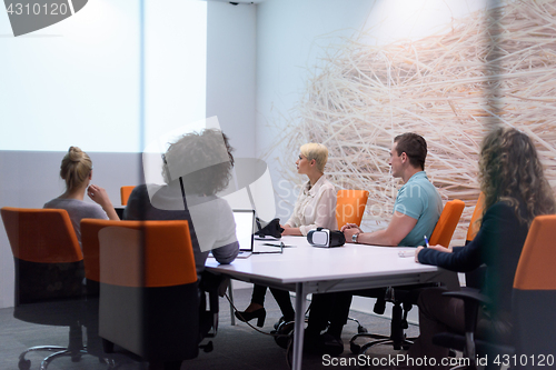 Image of Startup Business Team At A Meeting at modern night office buildi