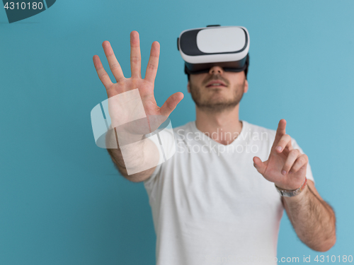 Image of man using VR headset glasses of virtual reality