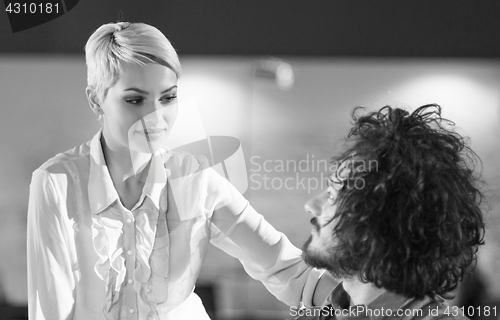 Image of Young businesswoman explaining the problem