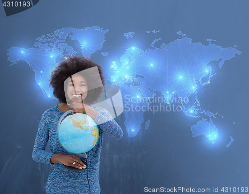 Image of black woman holding Globe of the world