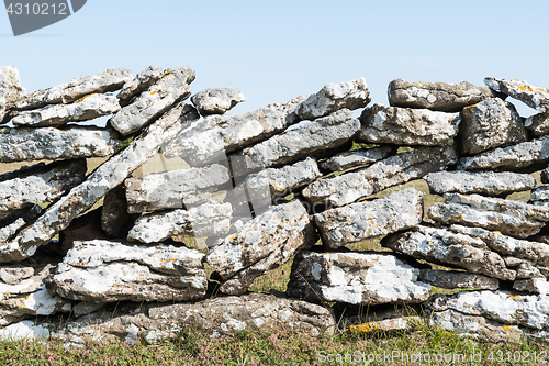 Image of Old limestone stone wall closeup