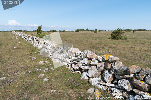 Image of Fence of old traditional stone wall