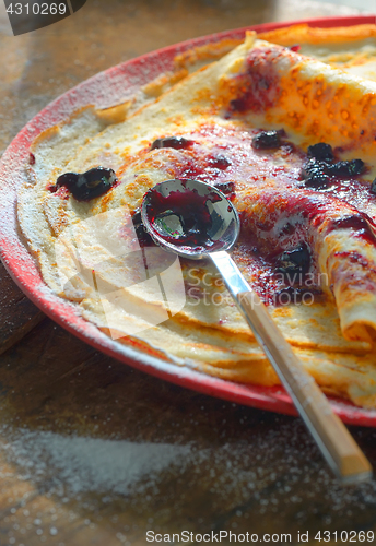 Image of Wheat pancakes with  cranberries jam