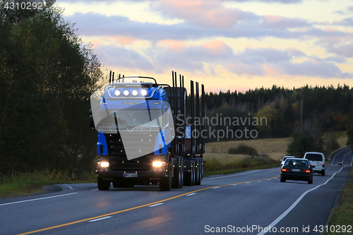 Image of Blue Scania Logging Truck at Dusktime