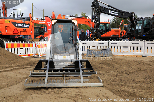 Image of Leveling Ground With Bobcat Track Loader 