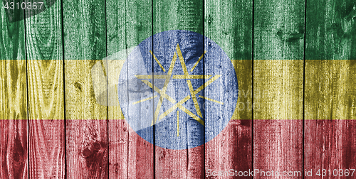 Image of Flag of Ethiopia on weathered wood