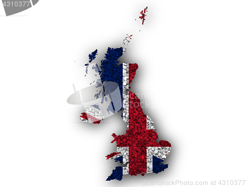 Image of Map and flag of Great Britain on poppy seeds,