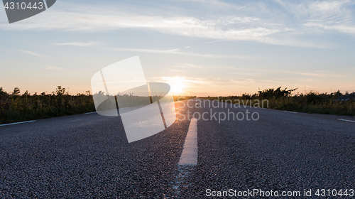 Image of Extreme low angle view at an asphalt road