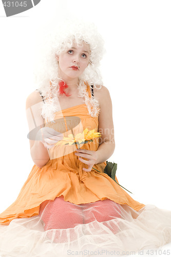 Image of Portrait of the clown with sunflower