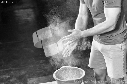 Image of Gym Chalk Magnesium Carbonate hands clapping man