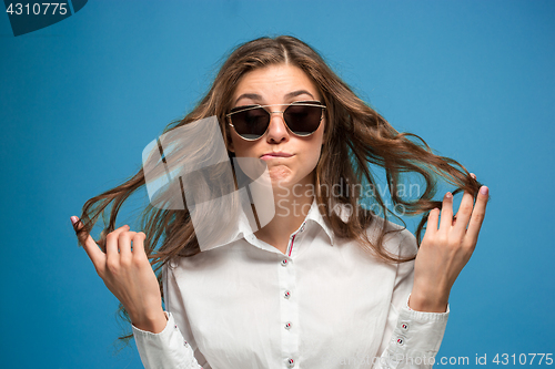 Image of The young woman\'s portrait with different emotions