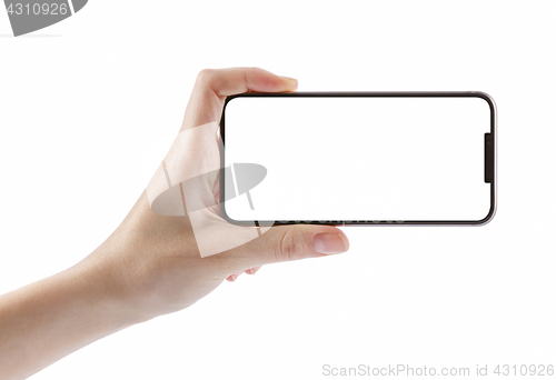 Image of Young girl hand holding black smart phone on white clipping path
