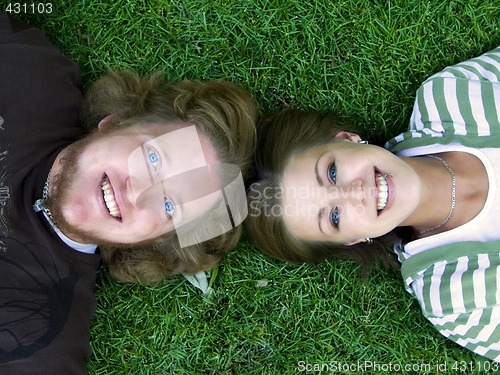 Image of Young couple looking at the Camera