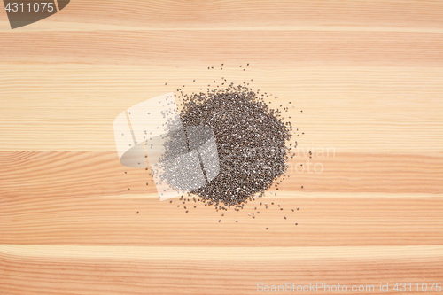 Image of Chia seeds on wood