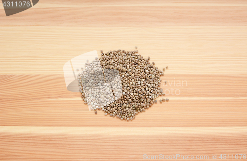 Image of Hemp seeds on wood