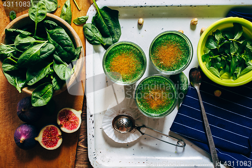 Image of Green smoothies with leaves of fresh mint