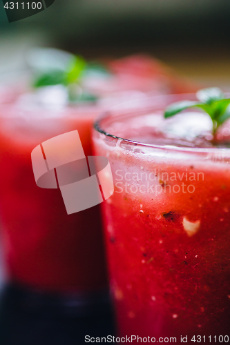 Image of Two glasses of red smoothie