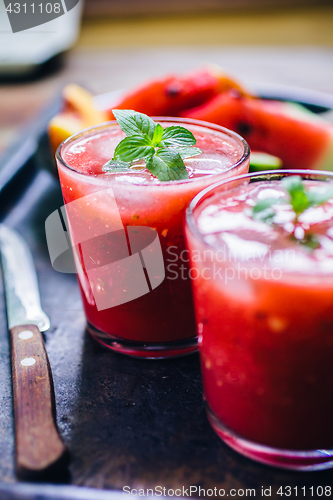 Image of Two glasses of red smoothie