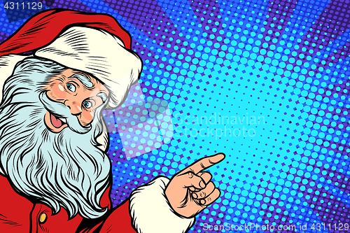 Image of Santa Claus pointing to copy space