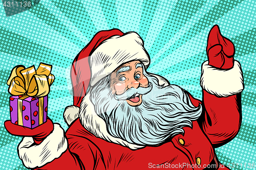 Image of Santa Claus with gift. New year and Christmas