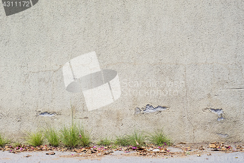 Image of abandoned grunge cracked stucco wall