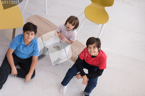 Image of boys in a new modern home