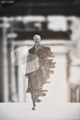 Image of Double exposure of senior businessman