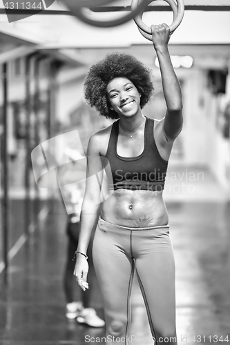 Image of black woman doing dipping exercise