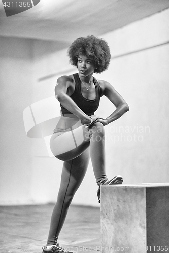 Image of black woman are preparing for box jumps at gym