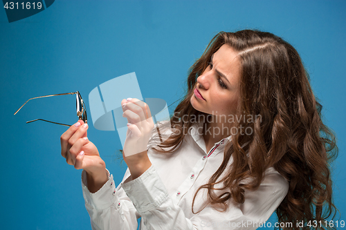 Image of The young woman\'s portrait with different emotions