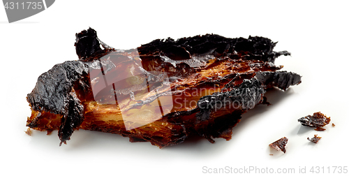 Image of burned croissant on a white background