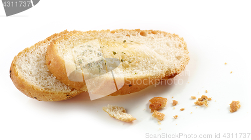 Image of grilled bread slices and crumbs