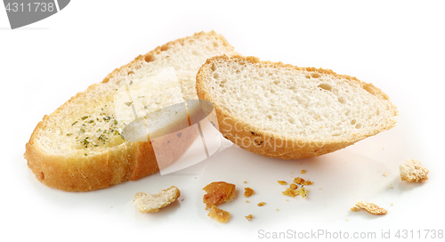 Image of grilled bread slices and crumbs