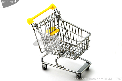 Image of empty shopping trolley on a white