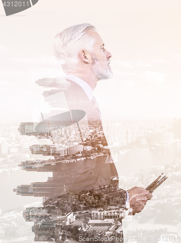 Image of Double exposure of senior businessman