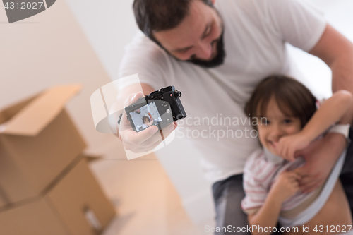 Image of selfie father and son