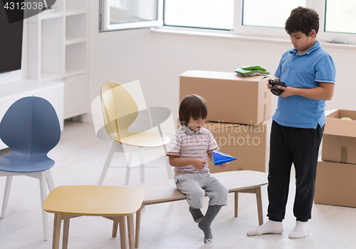 Image of boys in a new modern home