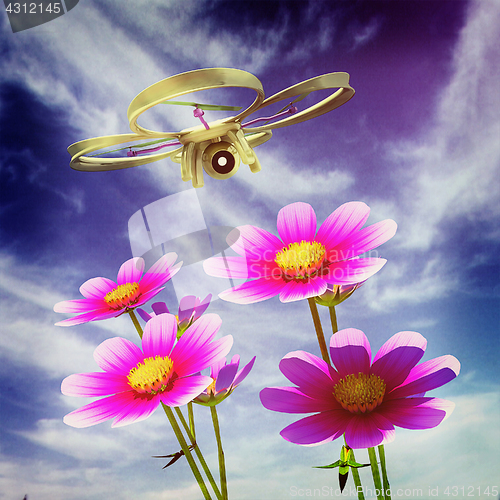 Image of Drone, quadrocopter, with photo camera against the sky and Beaut