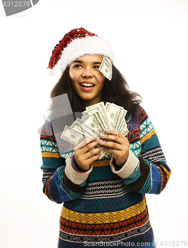 Image of cute young girl in santas red hat with money isolated