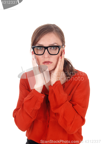 Image of Scared young woman with glasses.