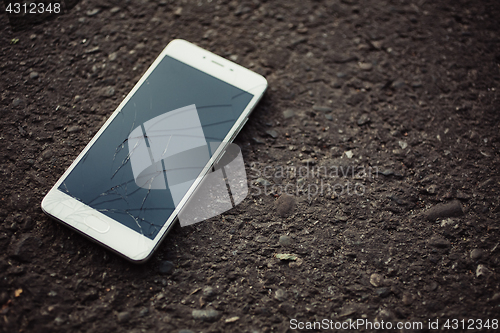 Image of Smartphone with a broken screen.