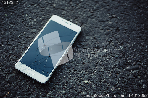 Image of Smartphone with a broken screen.