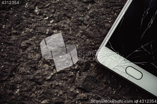 Image of Smartphone with a broken screen.