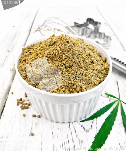 Image of Flour hemp in bowl with leaf on light board