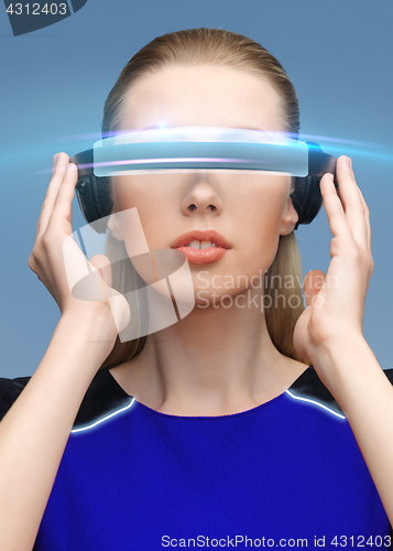 Image of beautiful woman in virtual reality 3d glasses