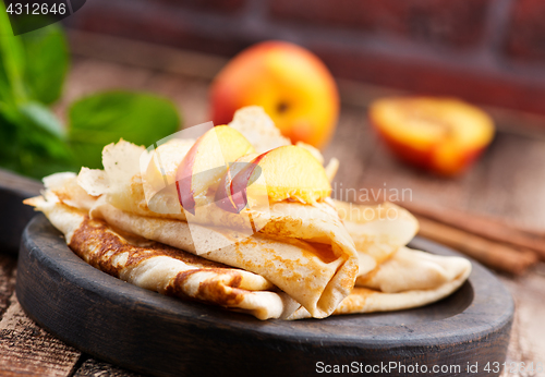 Image of pancake with peach 
