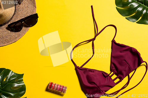 Image of Still life of fashion woman, objects on yellow