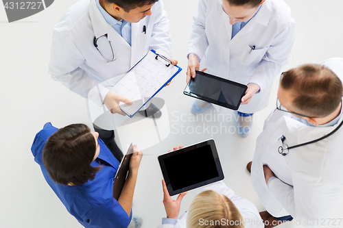 Image of doctors with cardiogram and and tablet pc